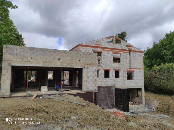 Elévation de la maçonnerie de l'étage d'une maison à QUINT-FONSEGRIVES